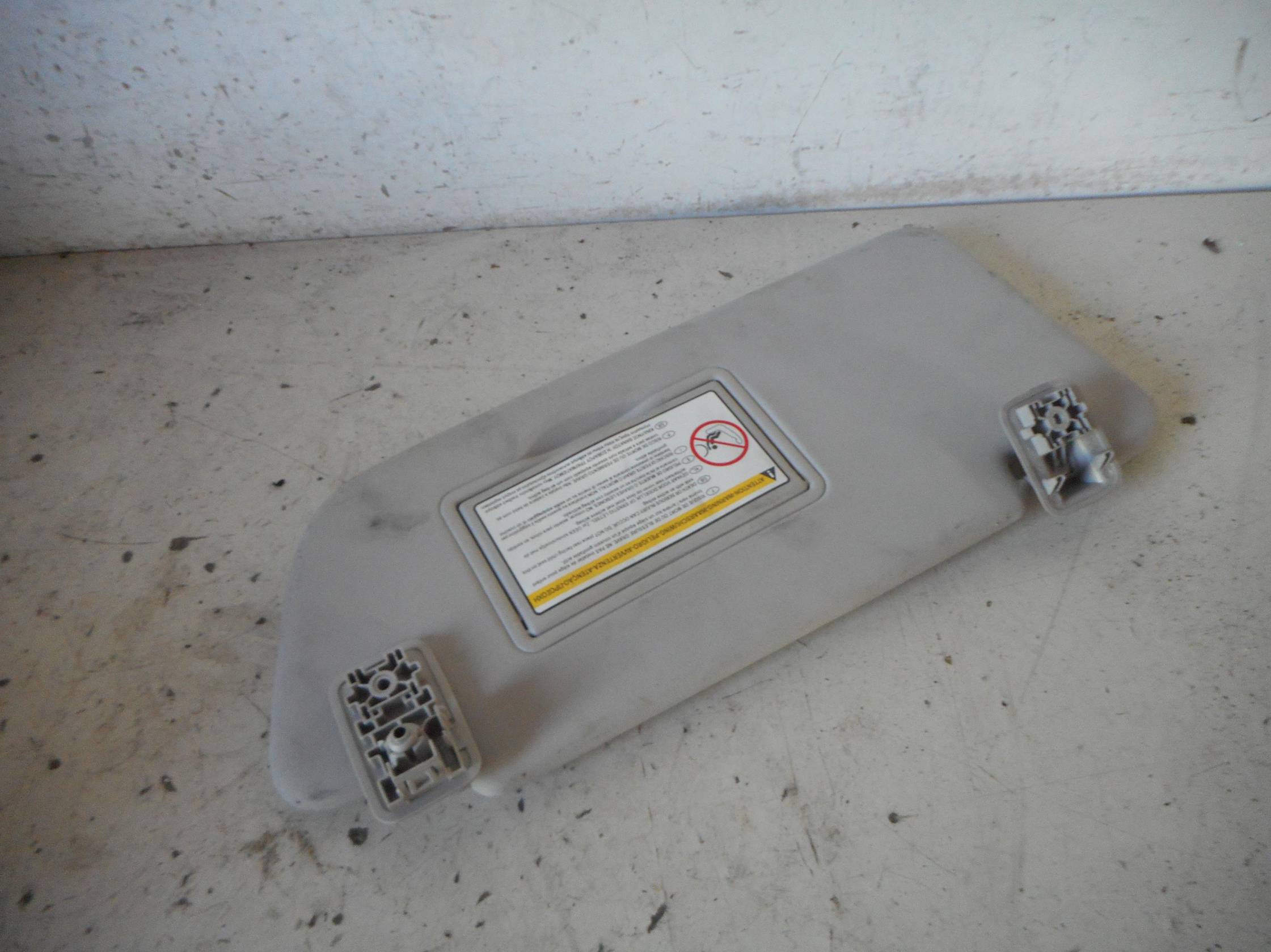 Aletta parasole parabrezza dx.